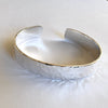Silver bracelet on a white background
