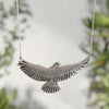 SilverKea pendant necklace against a blurred natural background