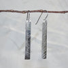 Silver earrings, long rectangle shape with lace imprint, silver hooks, handmade by Tania Mallow Jewelley
