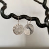 Silver disc earrings on silver hooks, with a beaten texture, 17mm diameter, handmade by Tania