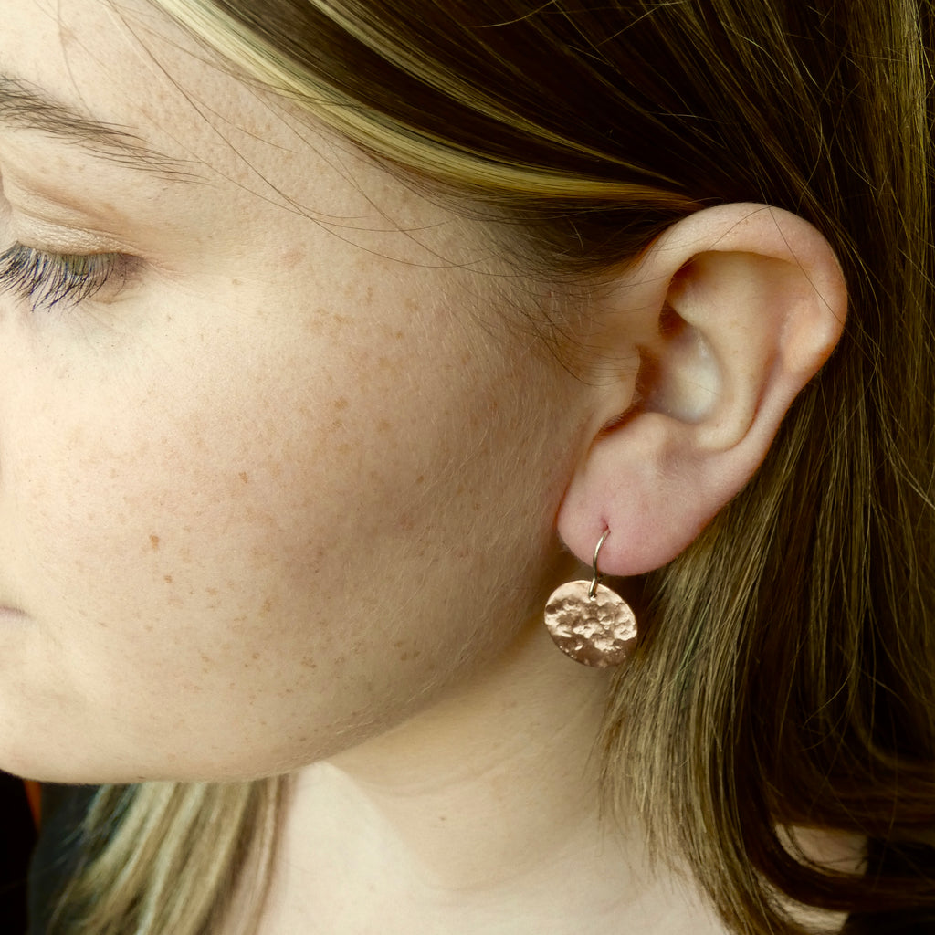 Copper disc earrings on silver hooks, with a beaten texture, 17mm diameter, handmade by Tania